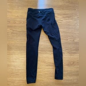 Black lululemon leggings with side pocket. Size 6